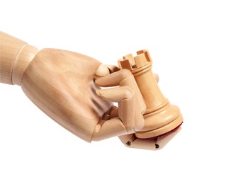 Photo of Robot holding chess piece isolated on white. Wooden hand representing artificial intelligence