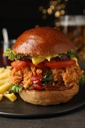 Photo of Delicious burger with crispy chicken patty on table, closeup