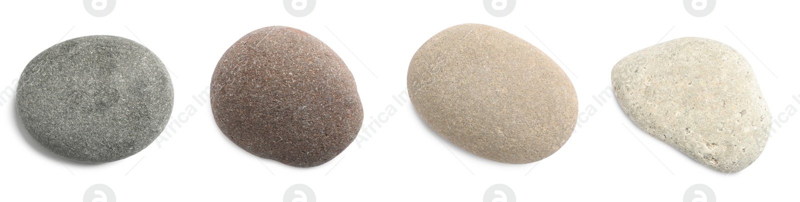 Image of Set with different spa stones on white background. Banner design