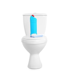 Photo of Toilet bowl and cleaning supplies on white background