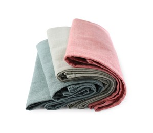 Photo of Rolled clean kitchen towels isolated on white