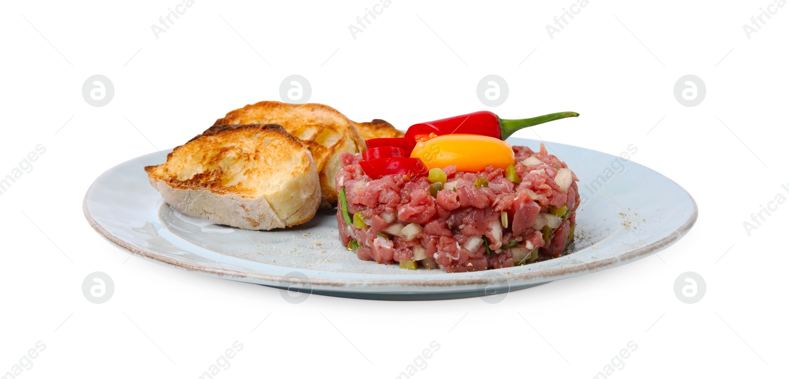 Photo of Tasty beef steak tartare served with yolk, toasted bread and other accompaniments isolated on white