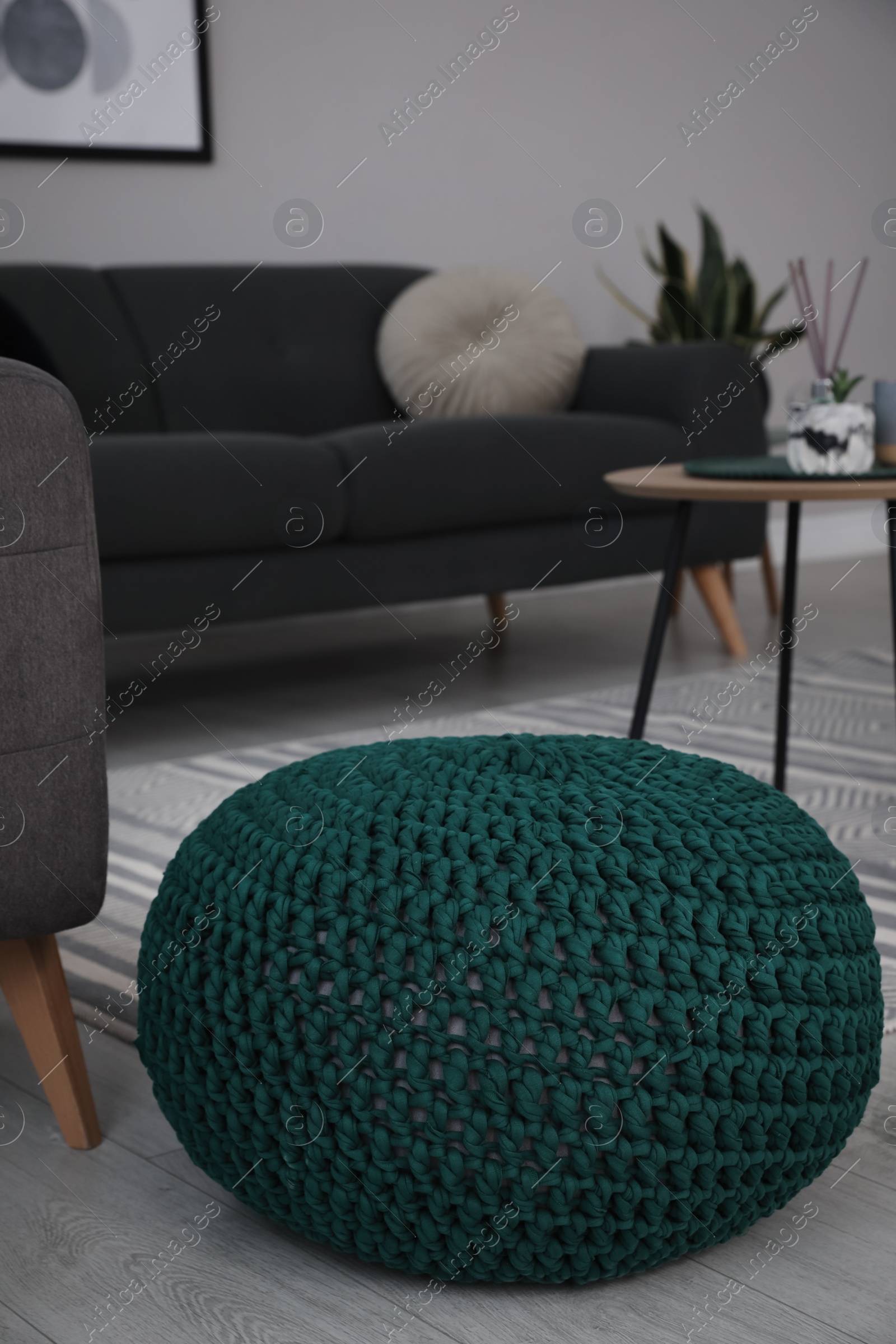 Photo of Stylish comfortable poufs in room. Home design