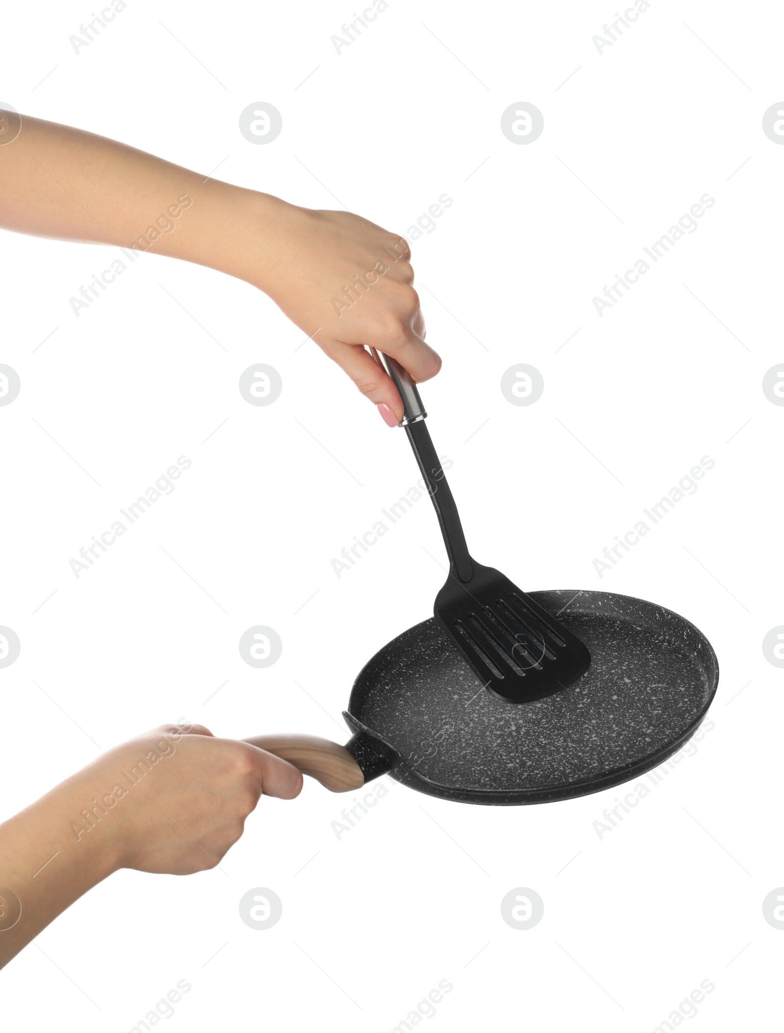 Photo of Woman with spatula and frying pan on white background, closeup