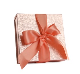 Photo of Beautiful pink gift box with ribbon and bow on white background