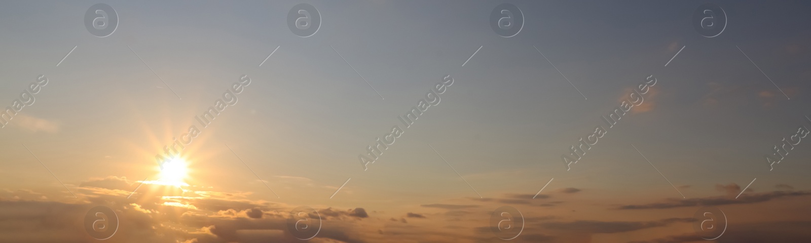 Image of Beautiful cloudy sky at sunset, banner design