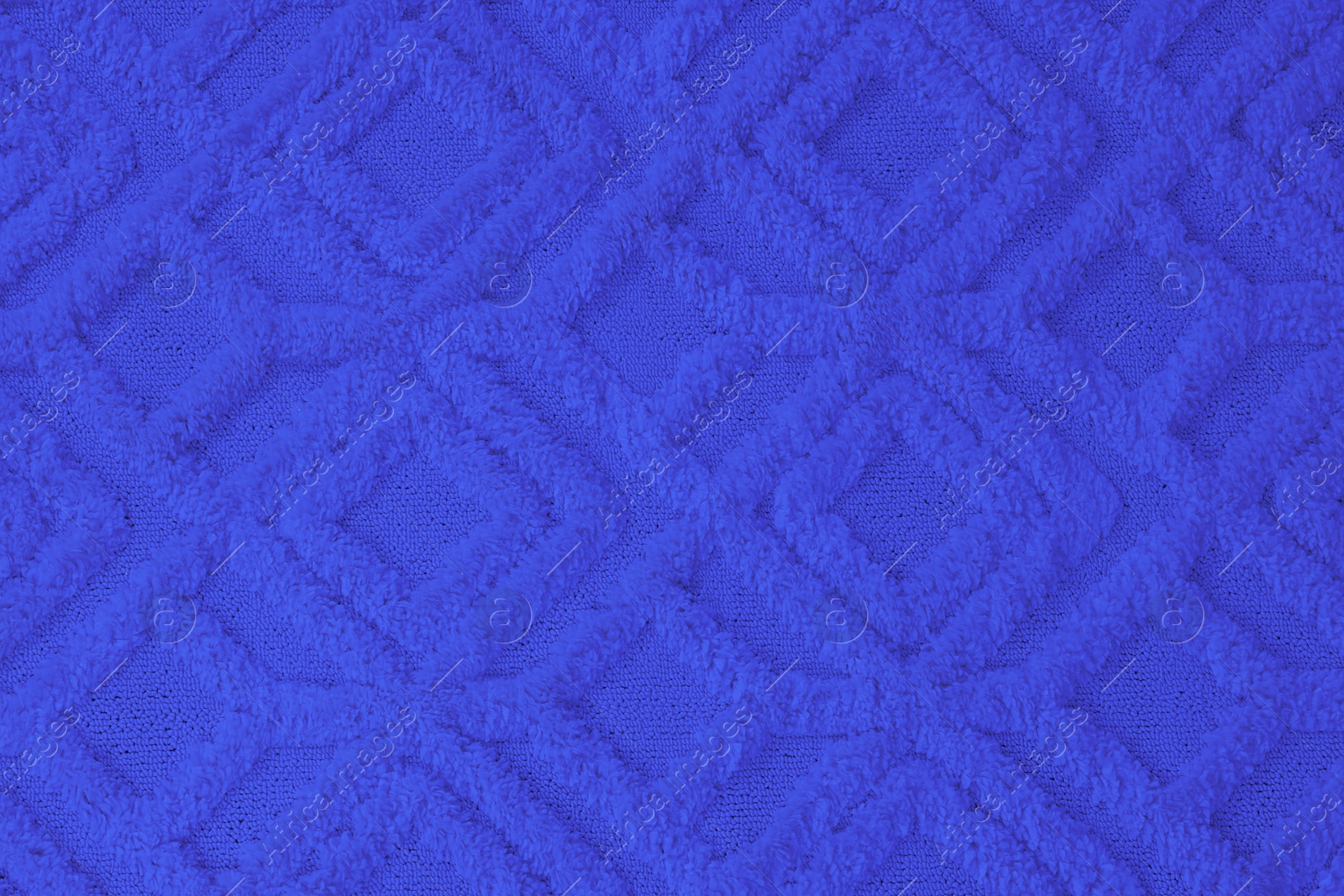 Image of Soft blue carpet with pattern as background, top view