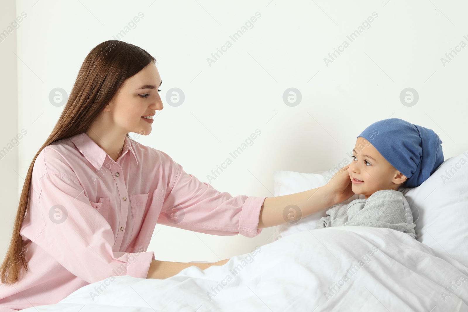 Photo of Childhood cancer. Mother and daughter in hospital