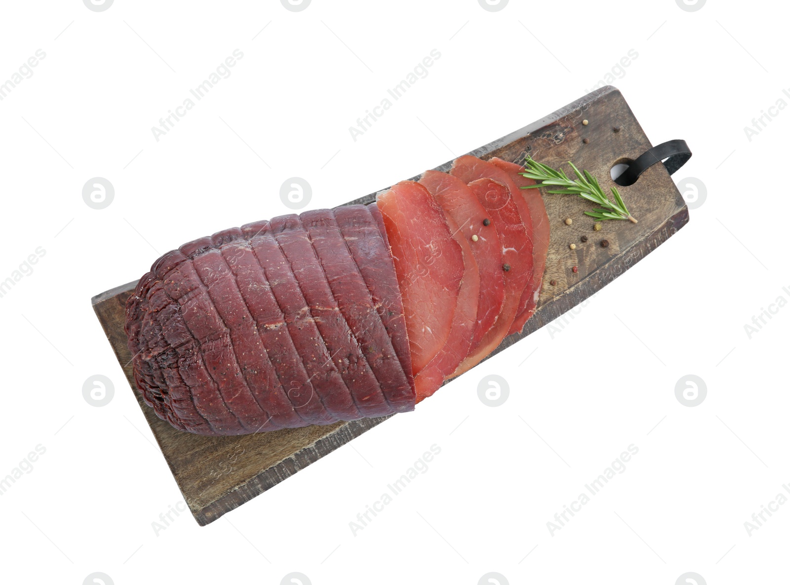 Photo of Tasty fresh dry bresaola, peppercorns and rosemary isolated on white, top view