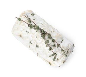 Photo of Delicious fresh goat cheese with thyme on white, top view