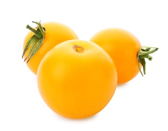 Delicious ripe yellow cherry tomatoes on white background