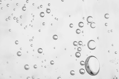 Soda water with bubbles of gas, closeup