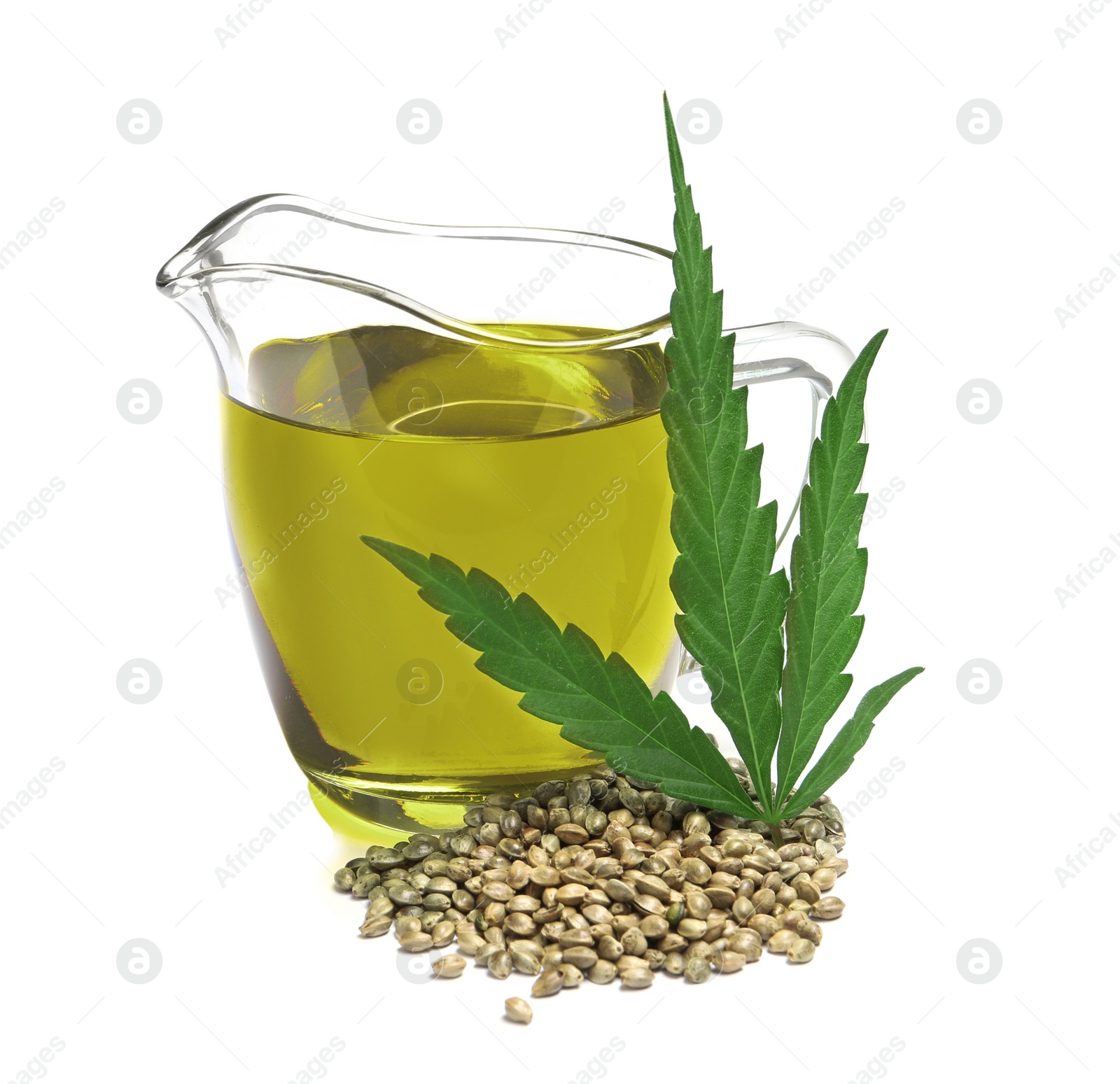 Photo of Jug with hemp oil, leaf and seeds on white background