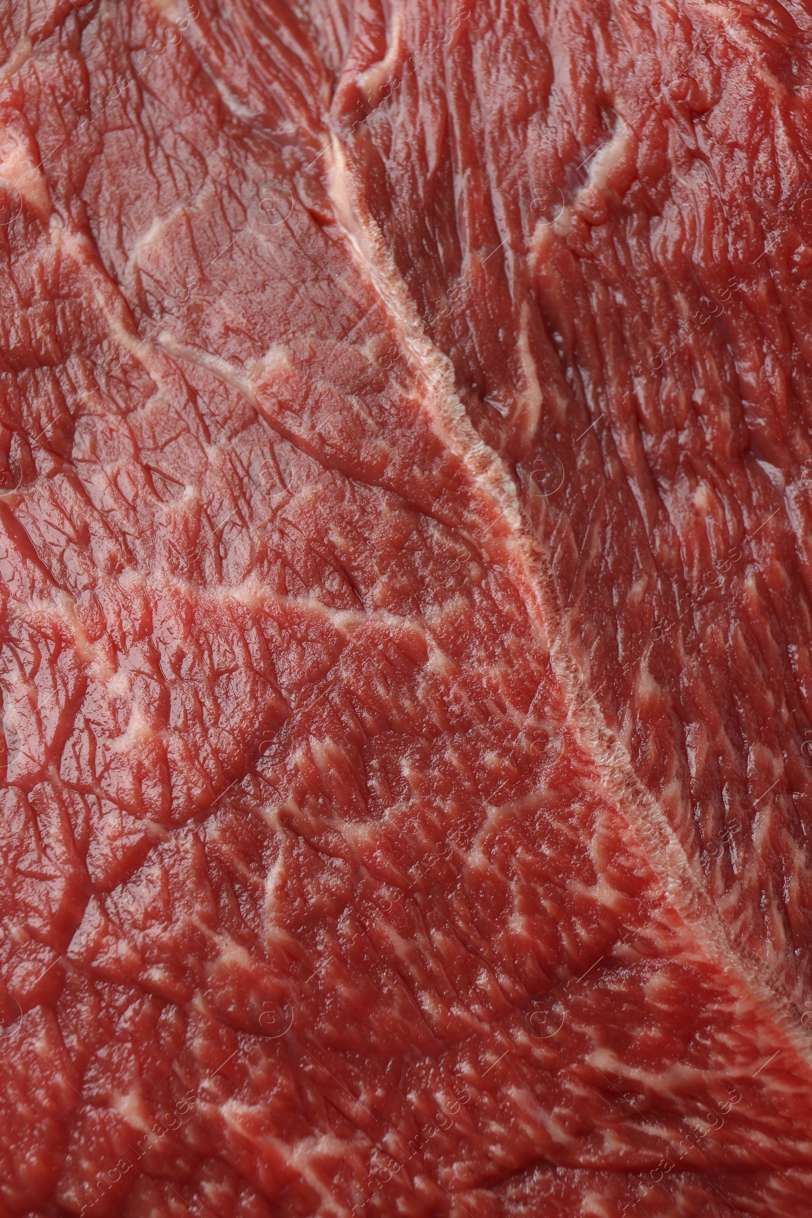 Photo of Texture of fresh beef meat as background, closeup