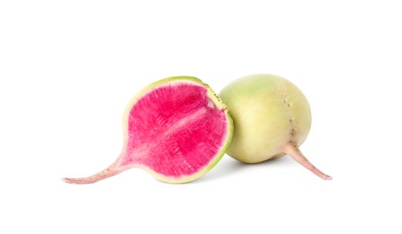 Photo of Cut and whole fresh ripe turnips on white background