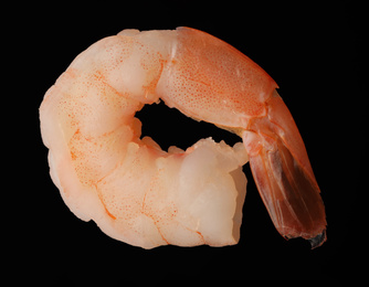 Freshly cooked delicious shrimp on black background
