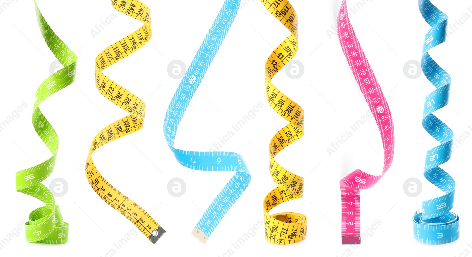 Image of Set with different measuring tapes on white background