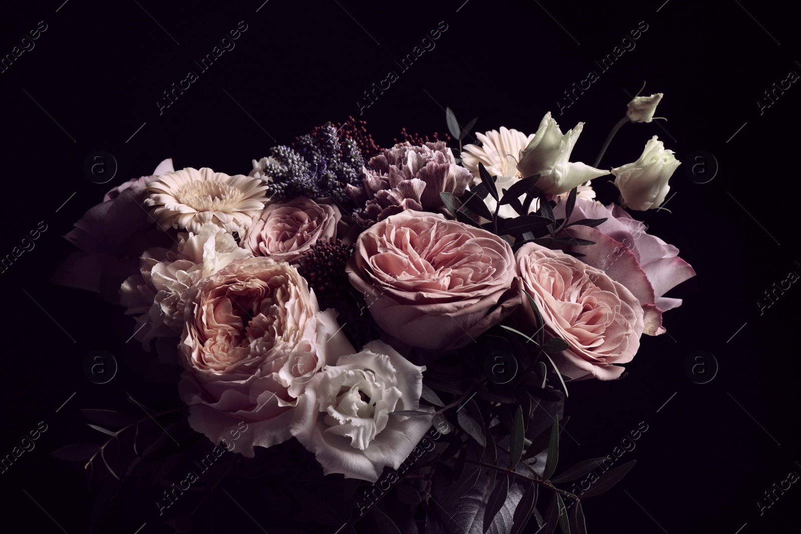 Photo of Beautiful bouquet on black background. Floral card design with dark vintage effect