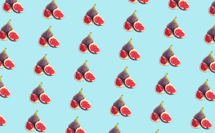 Pattern of cut and whole figs on pale light blue background