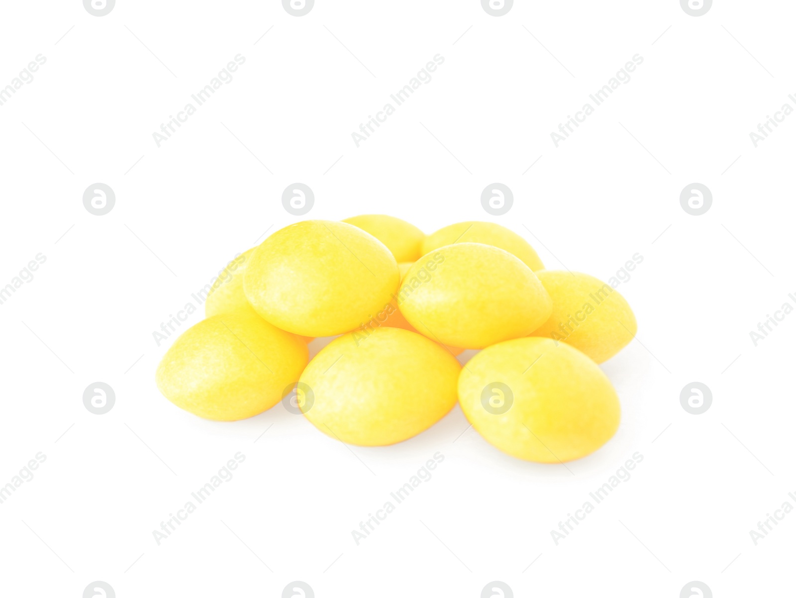 Photo of Tasty yellow chewing gums isolated on white