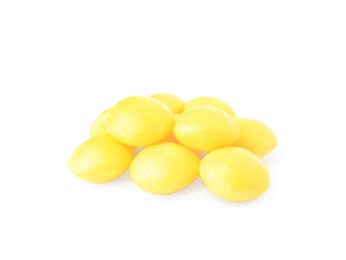 Photo of Tasty yellow chewing gums isolated on white