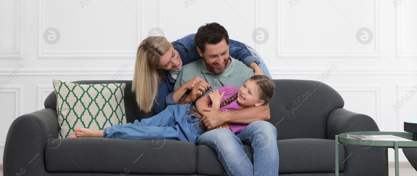 Image of Happy family with child at home. Banner design