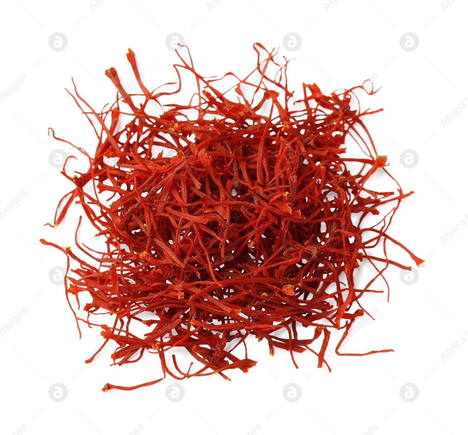 Photo of Pile of dried red saffron isolated on white, top view