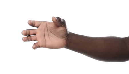 African-American man holding something in hand on white background, closeup