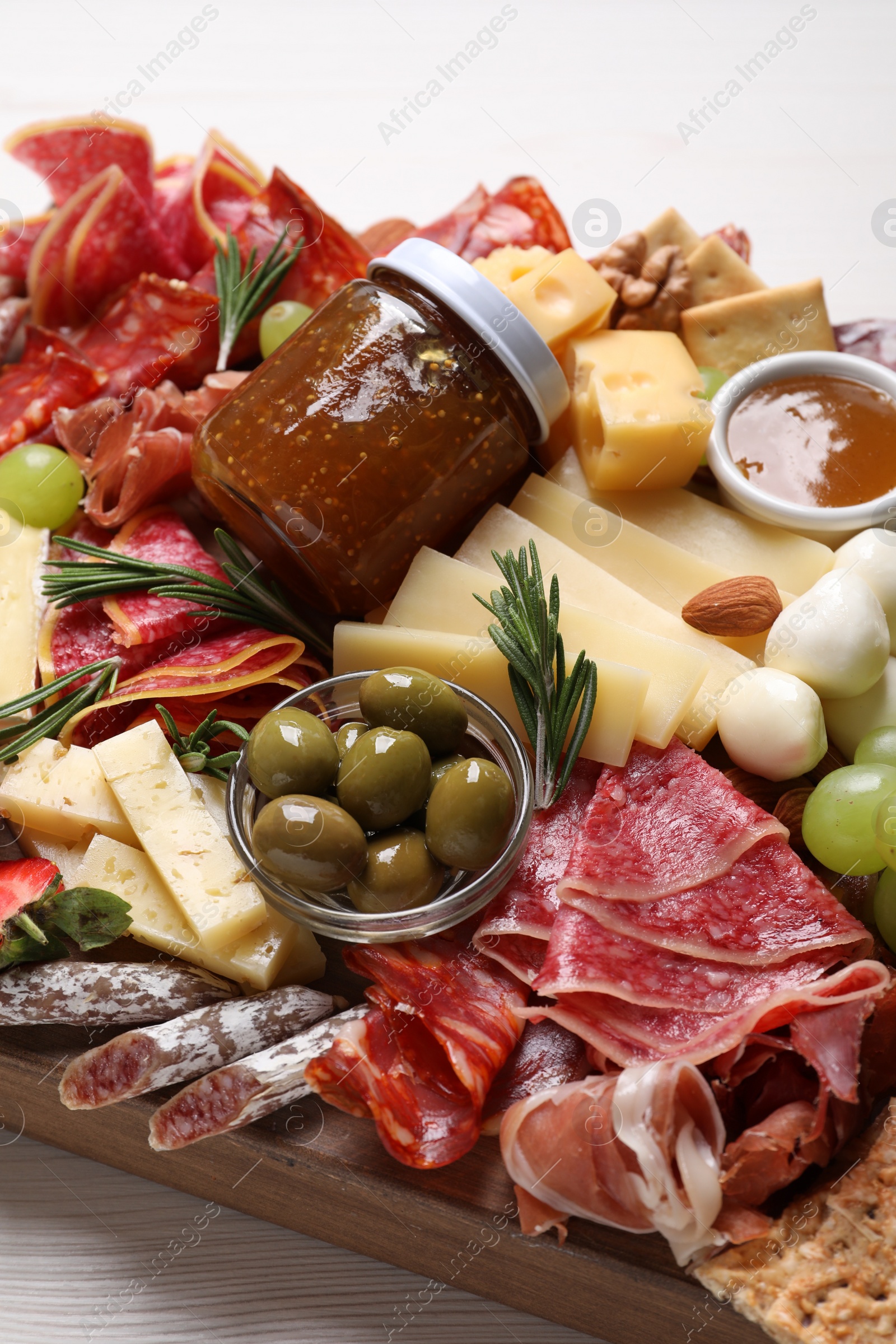 Photo of Assorted appetizer served on white wooden table