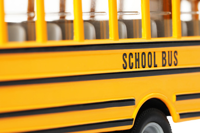 Photo of Yellow school bus, closeup. Transport for students