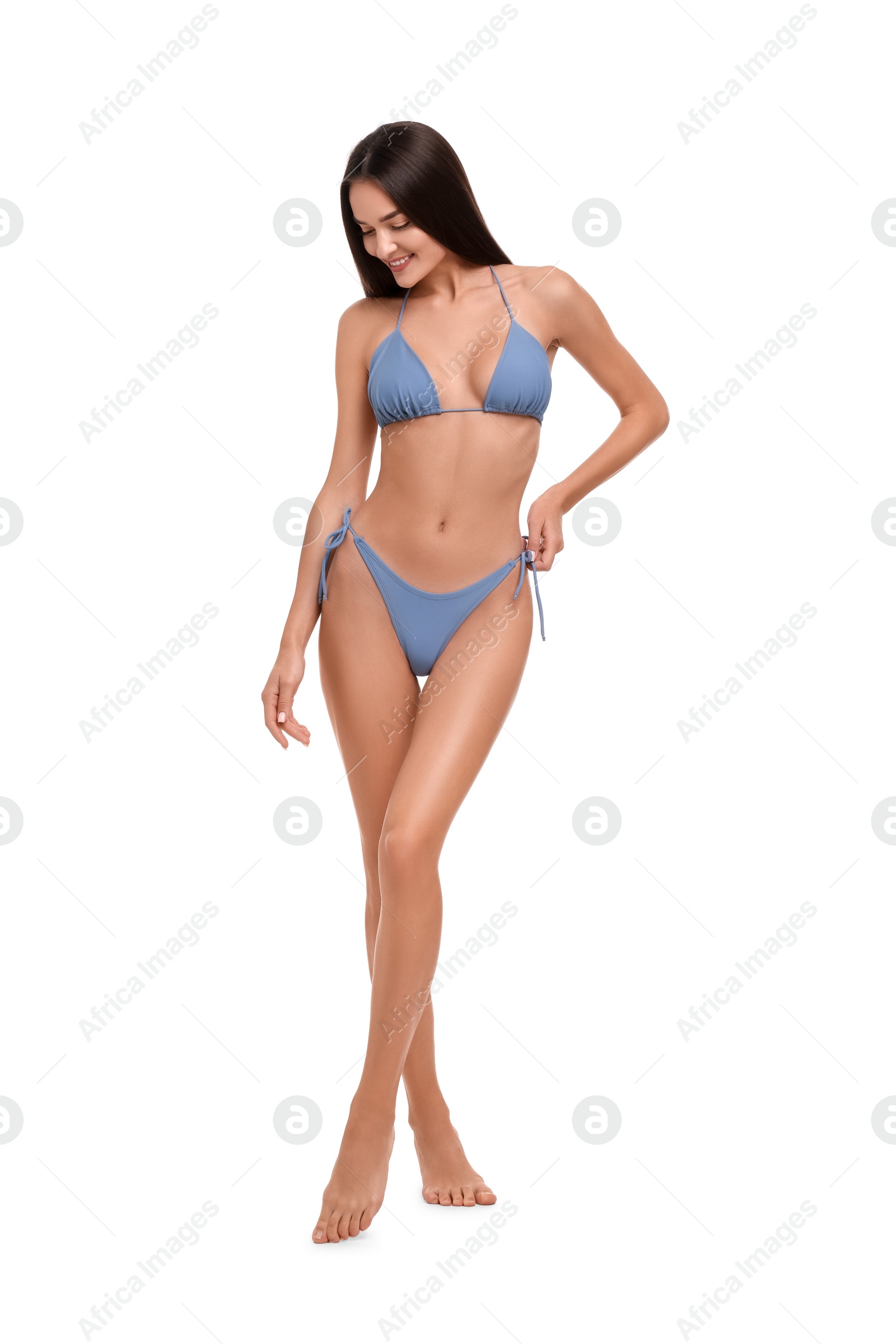 Photo of Young woman in stylish bikini isolated on white