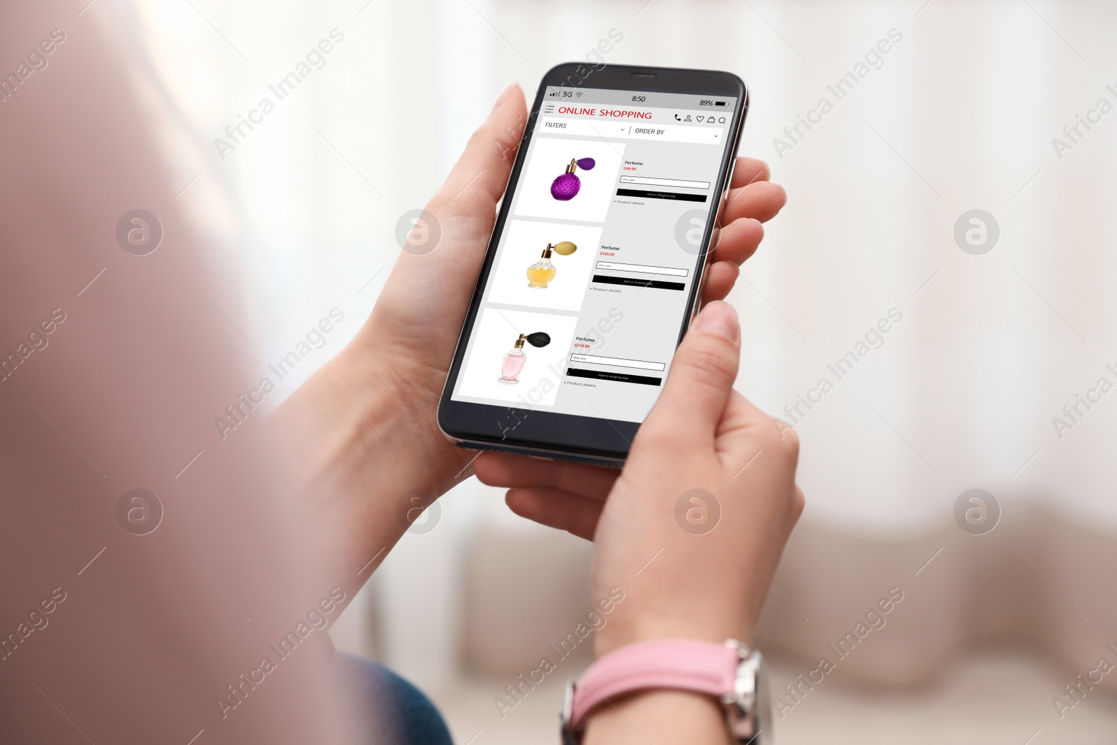 Image of Woman shopping online using smartphone indoors, closeup