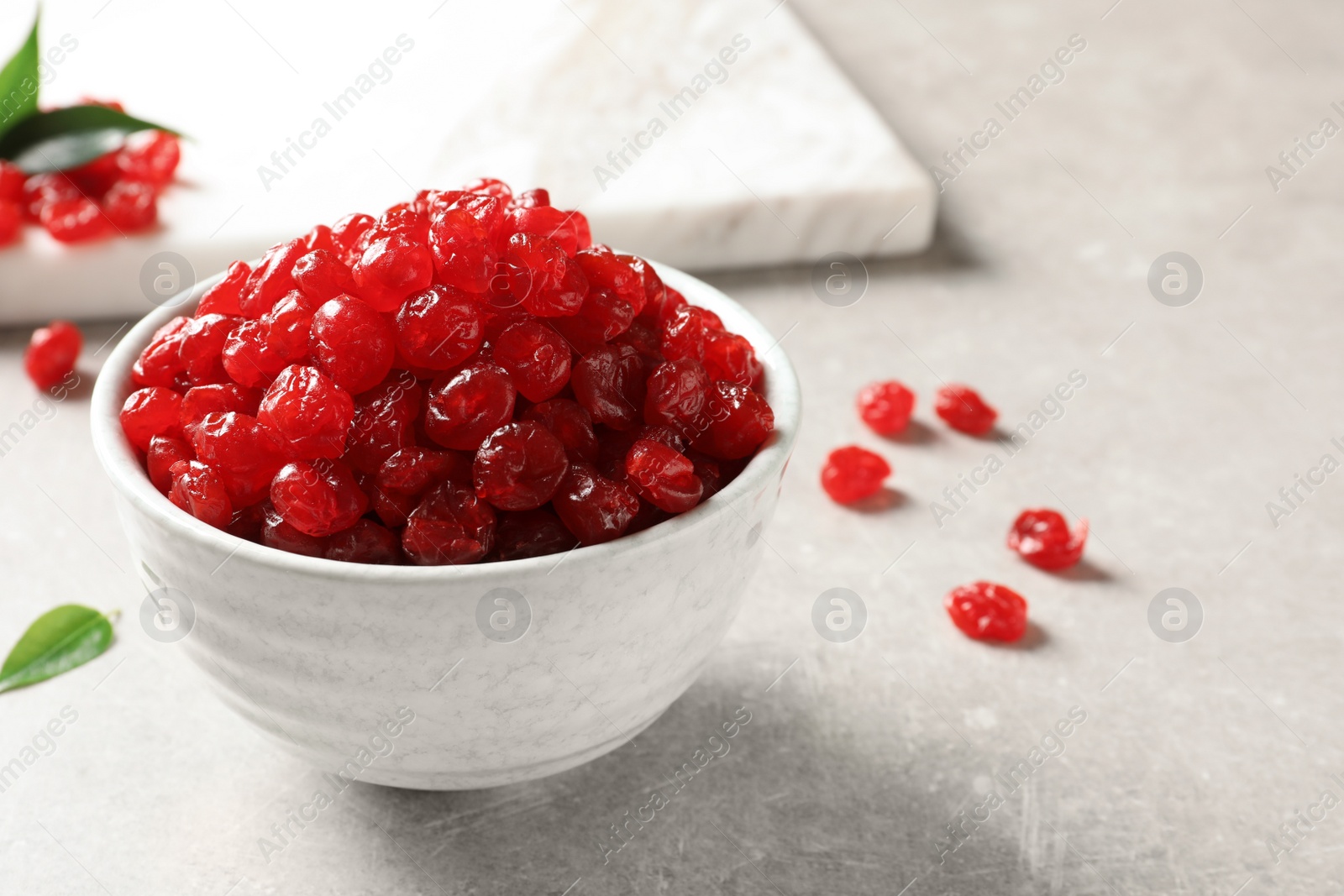 Photo of Bowl of sweet cherries on table, space for text. Dried fruit as healthy snack