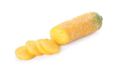 Pieces of raw yellow carrot isolated on white