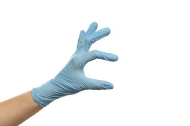 Doctor wearing light blue medical glove holding something on white background, closeup