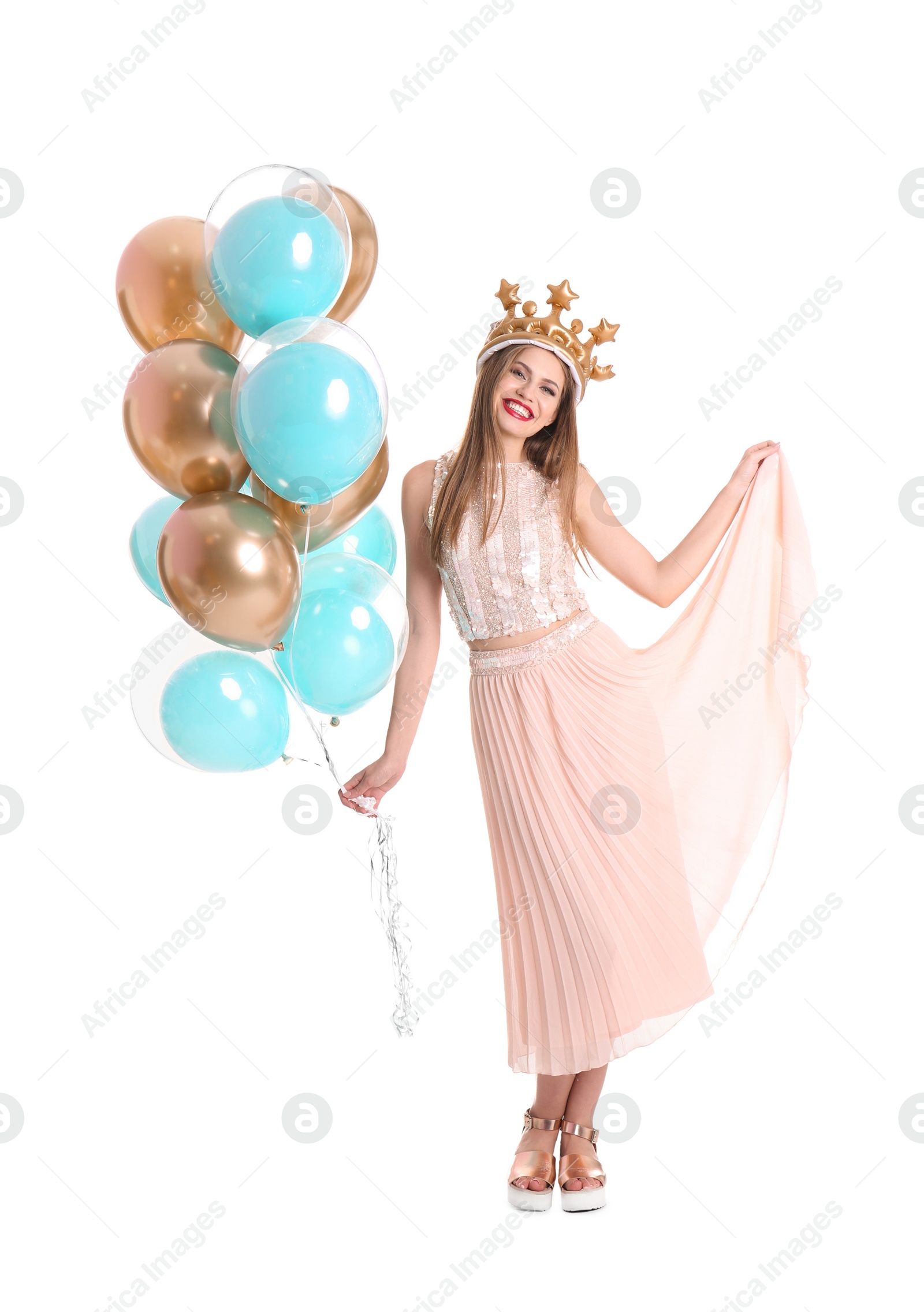 Photo of Young woman with crown and air balloons on white background