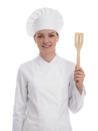 Photo of Happy woman chef in uniform holding wooden spatula on white background