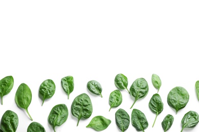 Photo of Fresh green healthy baby spinach leaves on white background, top view