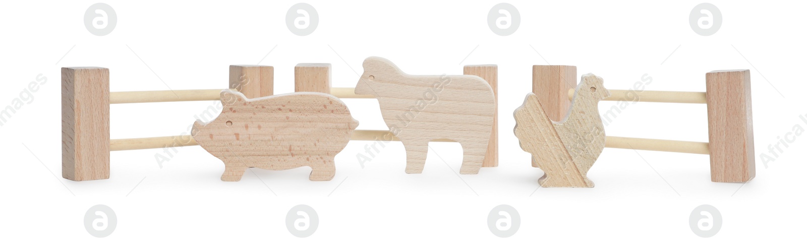 Photo of Kit with wooden farm animal figures isolated on white. Educational toy for motor skills development