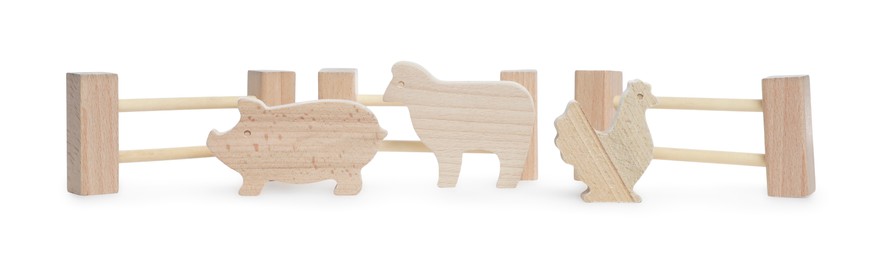 Photo of Kit with wooden farm animal figures isolated on white. Educational toy for motor skills development