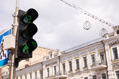 Photo of View of traffic light in city on sunny day. Space for text