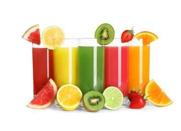 Photo of Glasses with different juices and fresh fruits on white background