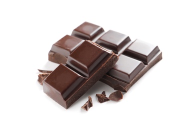 Photo of Pieces of tasty dark chocolate on white background