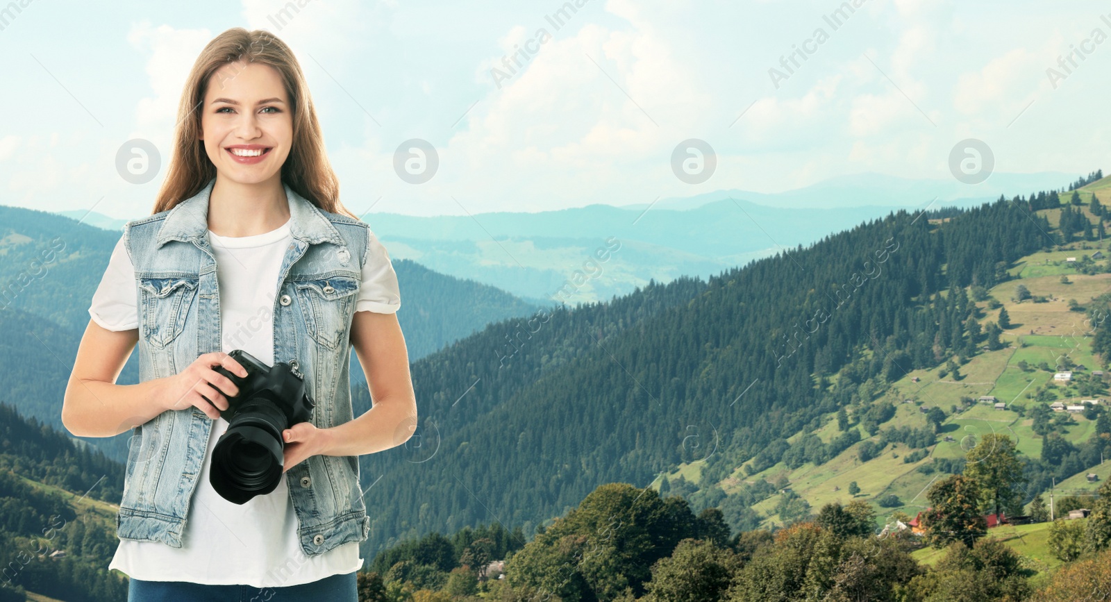 Image of Photographer holding professional camera and beautiful landscape with forest and mountain slopes on background, space for text