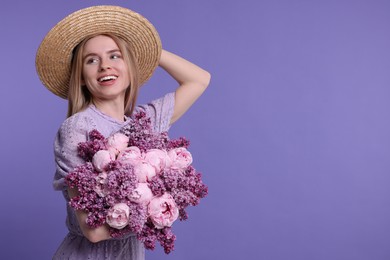 Beautiful woman with bouquet of spring flowers on purple background, space for text