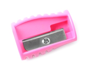 Bright pink pencil sharpener isolated on white, top view. School stationery