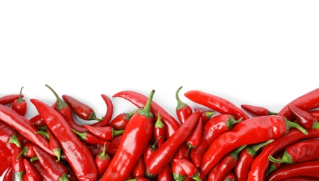 Red chili peppers on white background, top view. Space for text