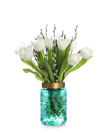 Beautiful bouquet of willow branches and tulips in vase isolated on white