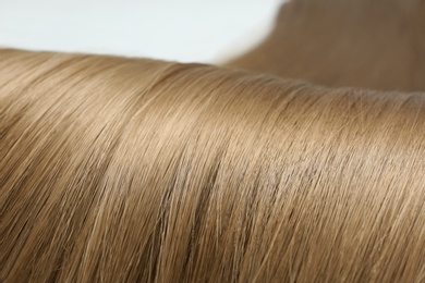 Beautiful light brown hair, closeup view. Professional hairdresser