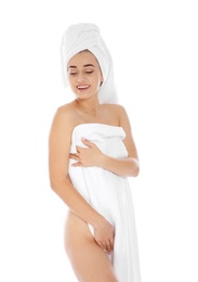 Portrait of young pretty woman with towels on white background